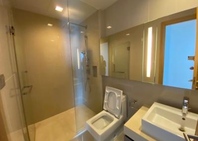 Modern Bathroom with Glass Shower and Vanity Mirror