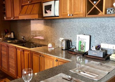 Cozy kitchen with wooden cabinets and modern appliances