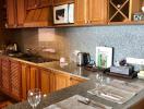 Cozy kitchen with wooden cabinets and modern appliances