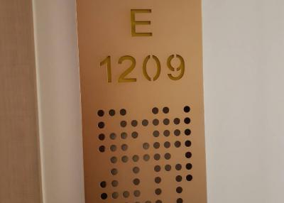 Apartment number plaque on the door