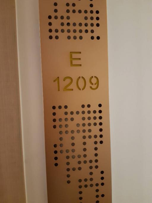 Apartment number plaque on the door