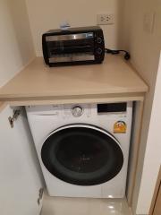 Modern appliances in a compact laundry area