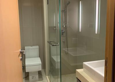 Modern bathroom with glass shower enclosure