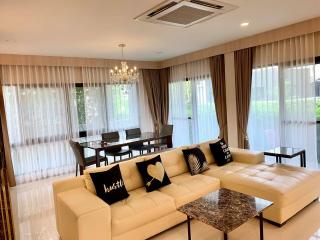 Elegant living room with dining area and modern furnishings