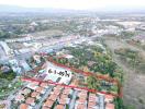 Aerial view of residential property with surroundings