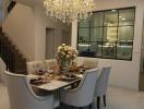 Elegant dining room with chandelier and modern decor