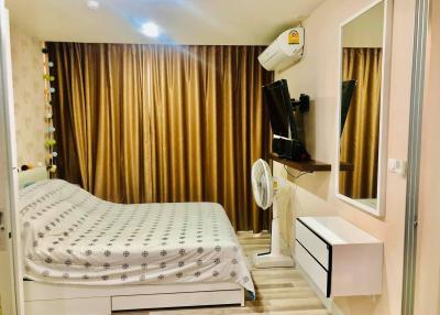 Cozy furnished bedroom with modern amenities