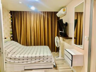 Cozy furnished bedroom with modern amenities