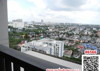 Expansive city view from high-rise balcony