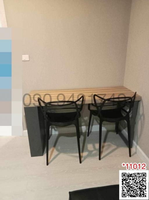 Modern dining space with table and chairs