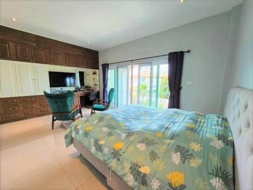 Spacious Bedroom with En Suite and Balcony Access