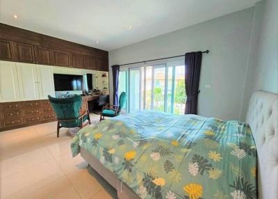 Spacious Bedroom with En Suite and Balcony Access