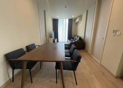 Spacious living room with dining table and seating area