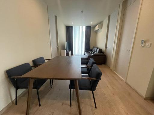 Spacious living room with dining table and seating area