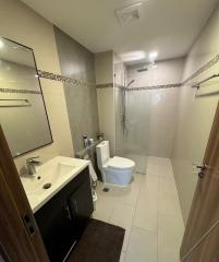 Modern bathroom with walk-in shower and vanity