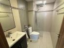 Modern bathroom with walk-in shower and vanity