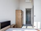 Minimalist bedroom with wooden wardrobe and modern design