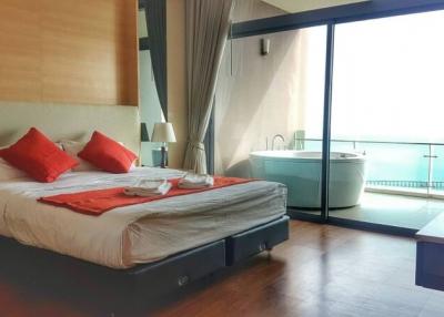 Modern bedroom with ocean view and en-suite open bathroom