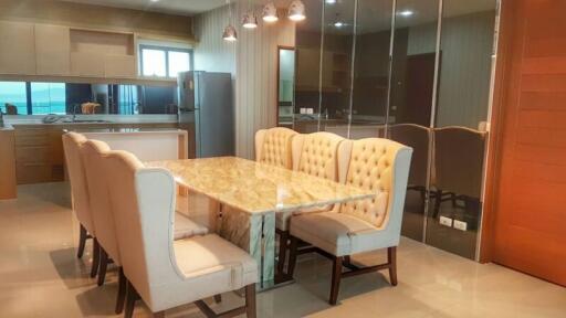 Modern kitchen with dining area and marble table