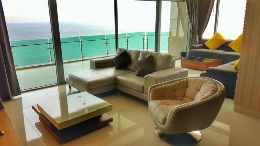 Modern living room with ocean view and ample sunlight
