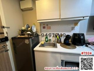 Compact fully equipped kitchen with modern appliances