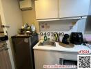 Compact fully equipped kitchen with modern appliances