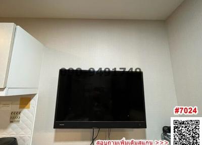 Wall-mounted television in a modern living room