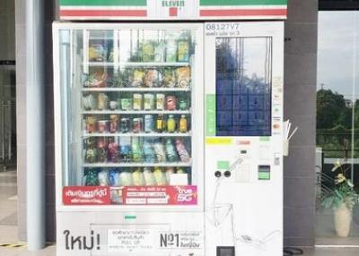 Refrigerated vending machine at a commercial building entrance