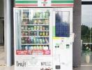 Refrigerated vending machine at a commercial building entrance