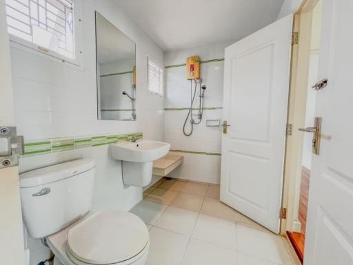 Bright modern bathroom with white fixtures