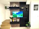 Modern living room interior with mounted television and decorative shelving