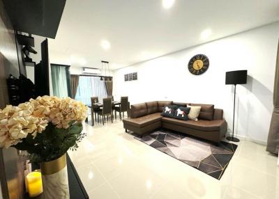 Spacious and modern living room with adjoining dining area
