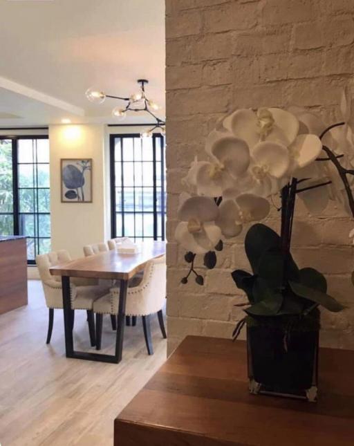 Elegant dining room with natural lighting and modern decor