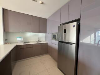 Modern kitchen with stainless steel appliances and ample cabinet space