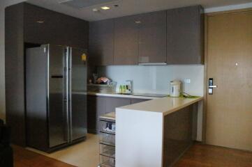 Modern kitchen with stainless steel appliances and ample cabinetry