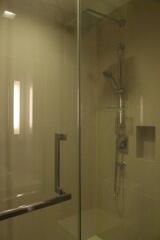 Modern bathroom with a glass-enclosed shower