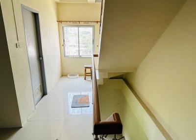 Narrow staircase with natural light
