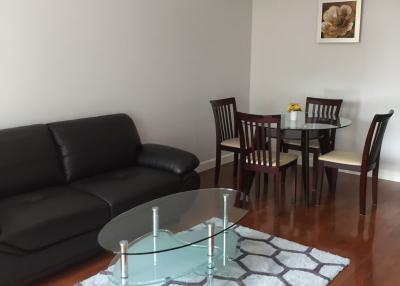 Modern living room with dining area and stylish furniture