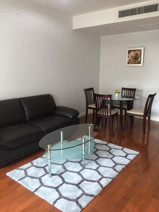 Modern living room with dining area and stylish furniture