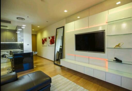 Modern living room interior with mounted television and comfortable seating