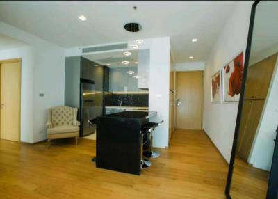 Modern kitchen with wooden floors and an open layout