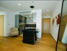 Modern kitchen with wooden floors and an open layout