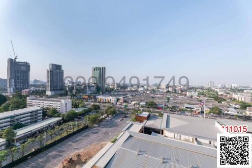 Aerial view of the urban landscape showcasing buildings and roads