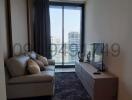 Modern living room with large window offering city views