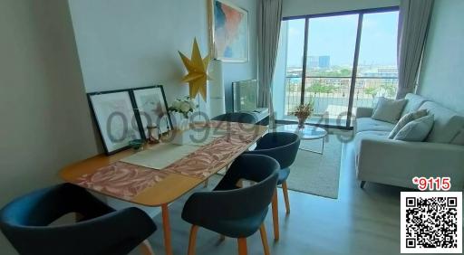 Modern living room with dining area and city view