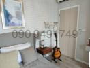 Contemporary bedroom with artistic wall decor and guitar