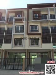 Modern multi-story residential building facade with balconies