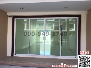 Sliding glass doors leading to the interior of a modern building