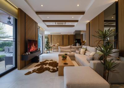 Modern living room interior with fireplace and large window