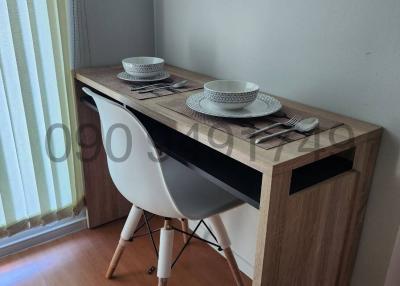 Compact dining space with table set for two